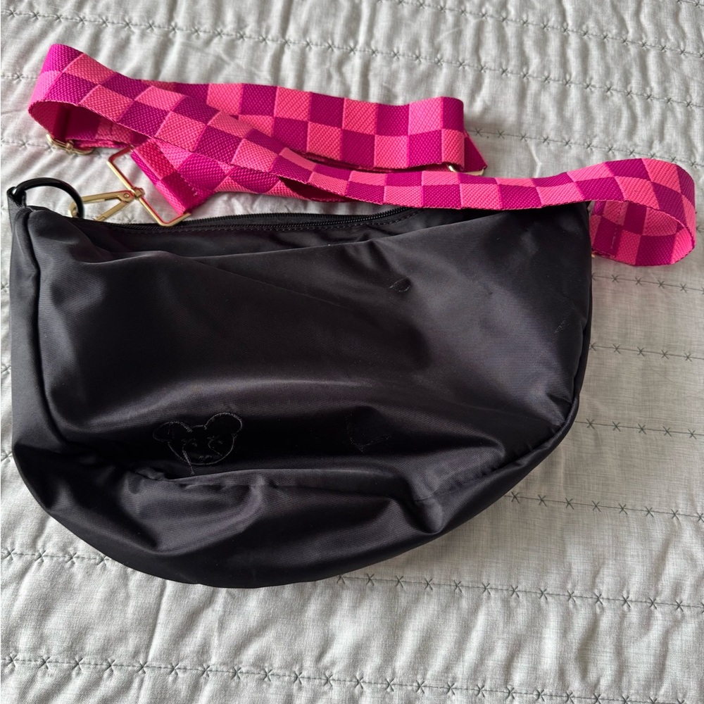 Elegant Black Crossbody Bag with Pink Strap